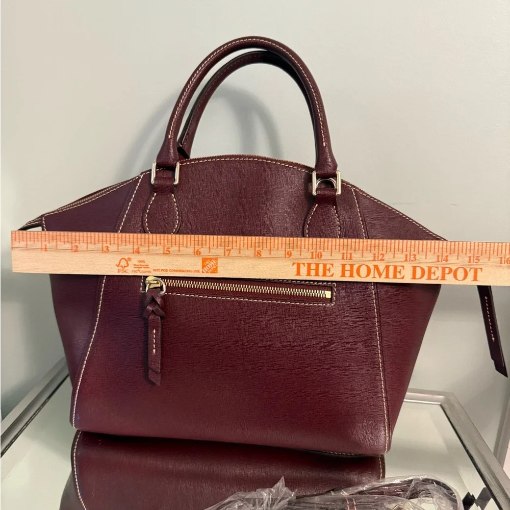 Dooney & Bourke reposhing this
